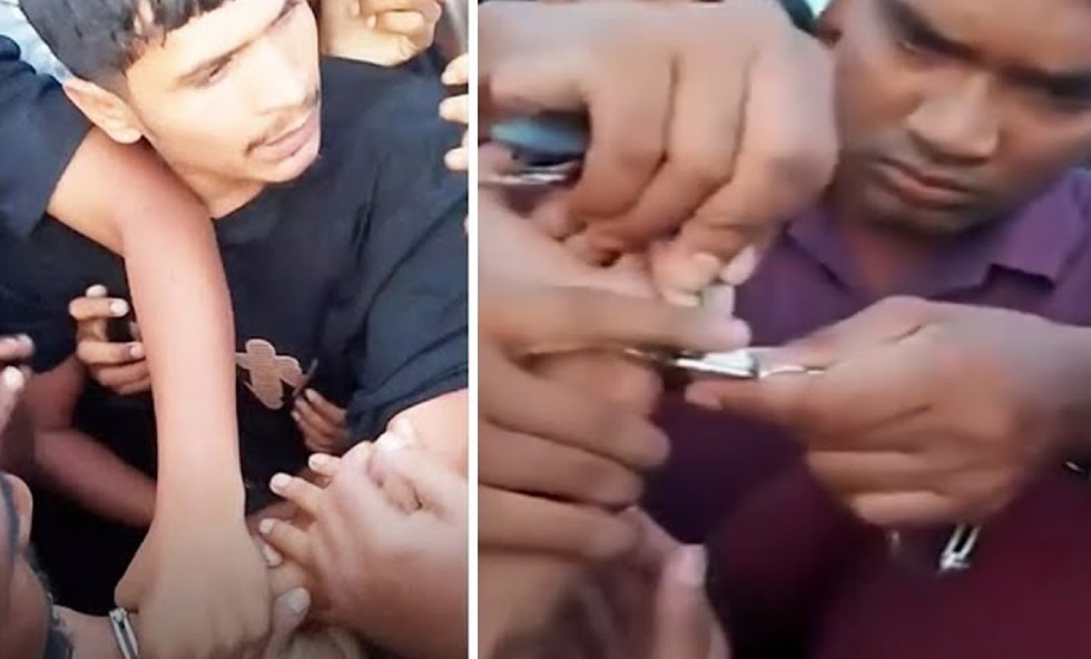তোপের মুখে হ্যান্ডকাপ পরা অবস্থায় ছাত্রলীগ কর্মীকে ছেড়ে দিল পুলিশ (ভিডিও)